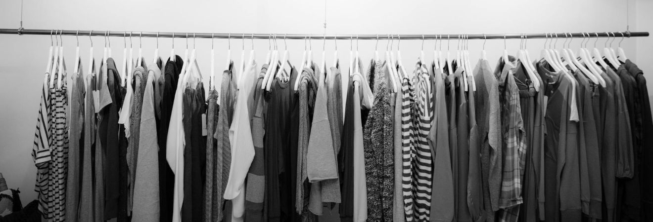 a row of clothes hanging