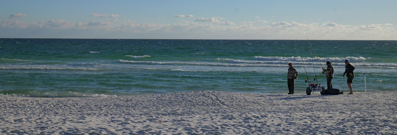 miramar beach with some people on it