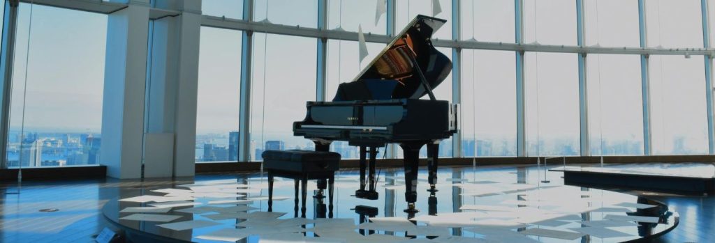 a grand piano in a grand hall