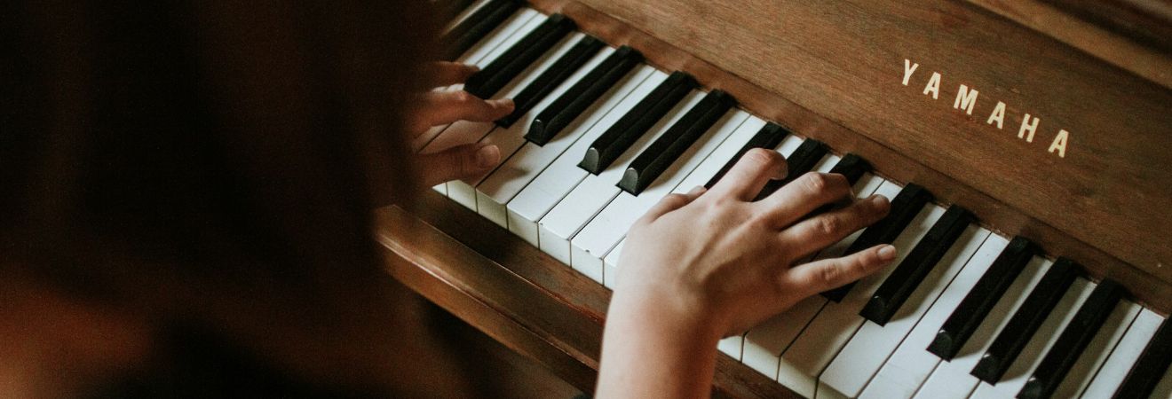 Person playing a piano